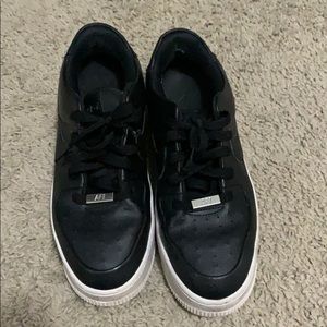 Black and white leather air force ones